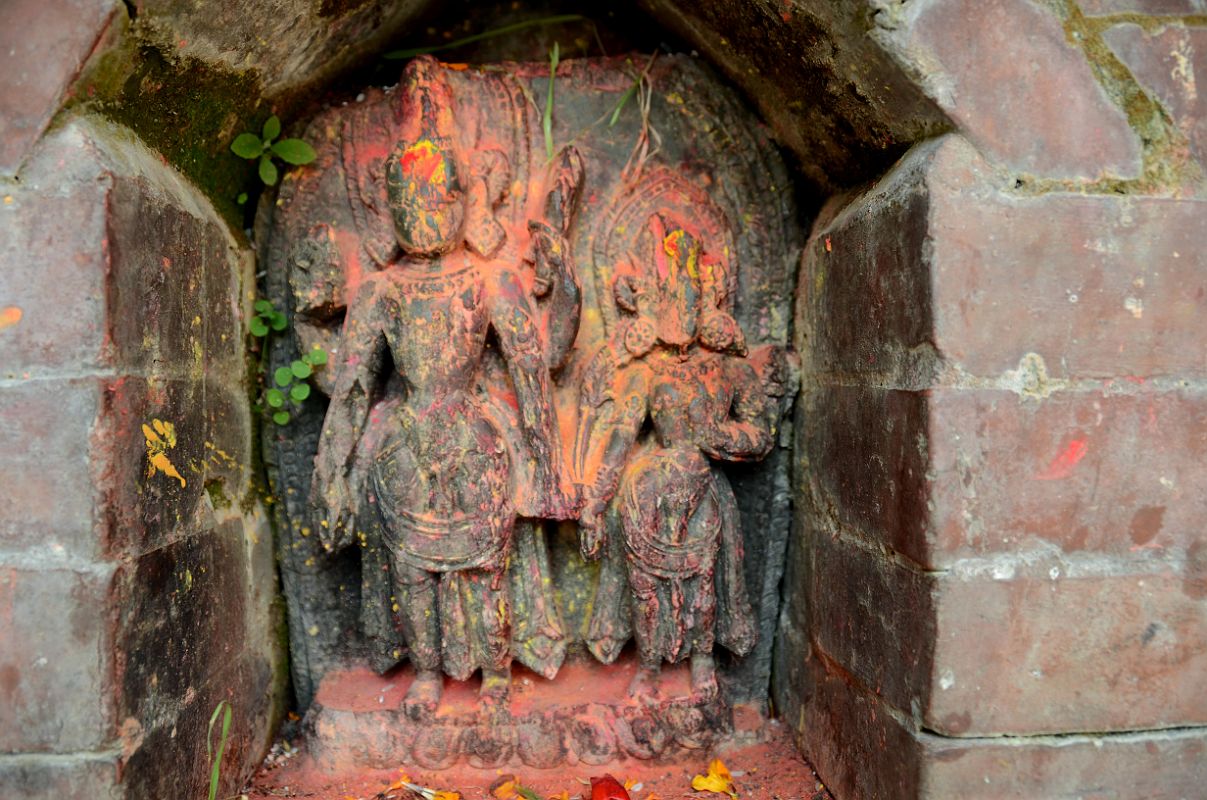 Kathmandu Changu Narayan 26 Vishnu And Garuda Image Just To The North Of Main Entrance To Changu Narayan Temple  Just to the north of the main entrance to Changu Narayan Temple is a rough statue of Vishnu and Garuda.